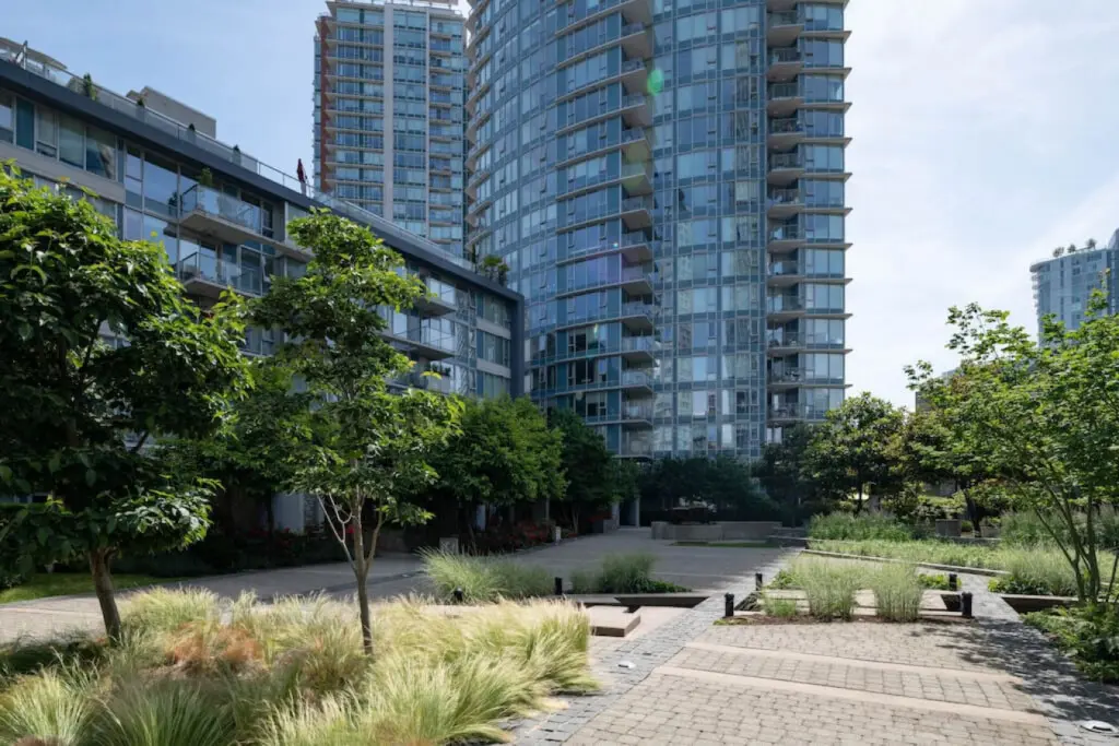 Serene Courtyard — relax and recharge in this lush, landscaped garden oasis, offering a peaceful escape right in the heart of downtown Vancouver.