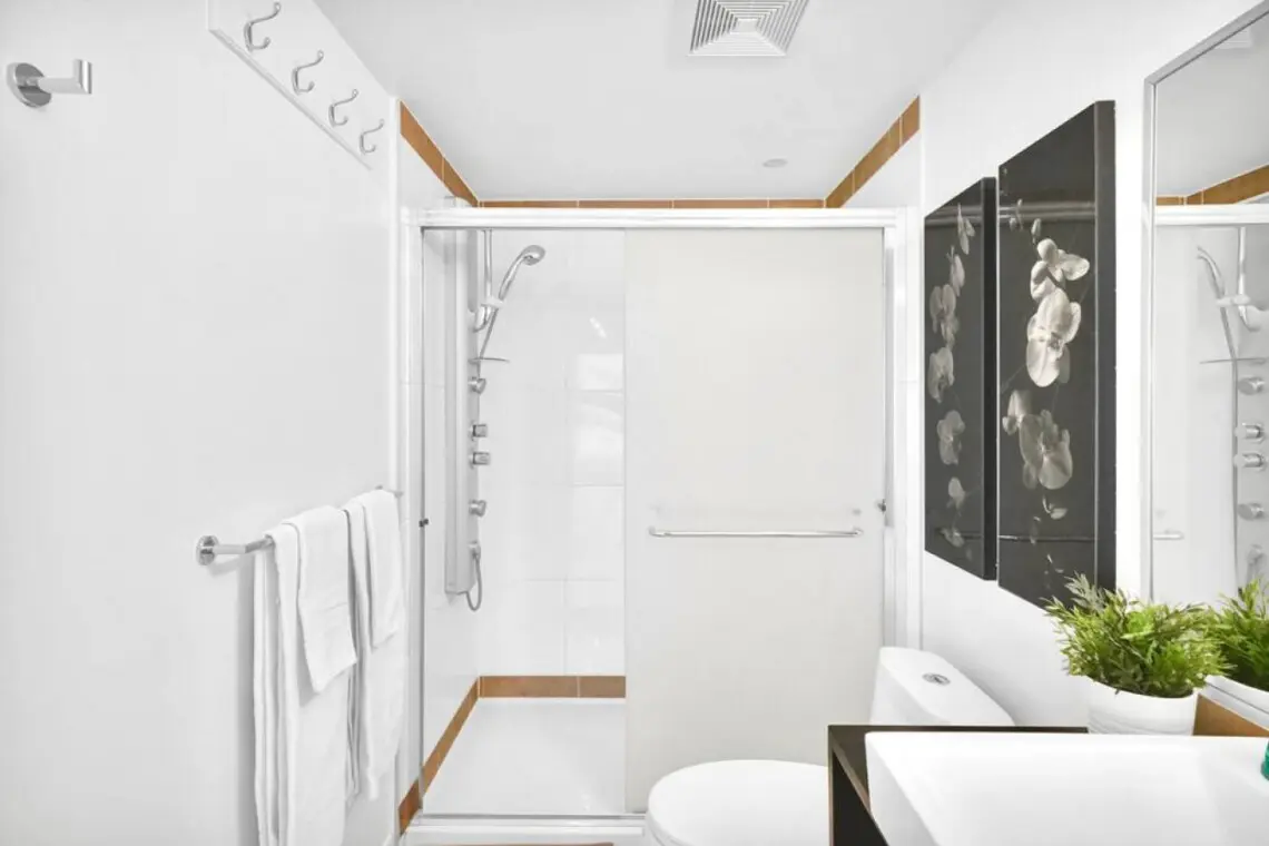 The second bathroom features a refreshing body jet shower — perfect for unwinding after a day of exploring Vancouver. Sleek finishes and thoughtful details create a serene space to relax and recharge in modern comfort.