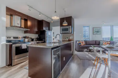 Modern fusion at its finest — this open-concept layout seamlessly connects the kitchen, dining, and living areas for effortless flow. A bright, contemporary space designed for both everyday comfort and stylish entertaining.