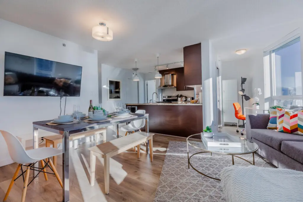 An open-concept layout that flows effortlessly — enjoy cooking, dining, and relaxing in one beautifully connected modern space filled with natural light and thoughtful design.