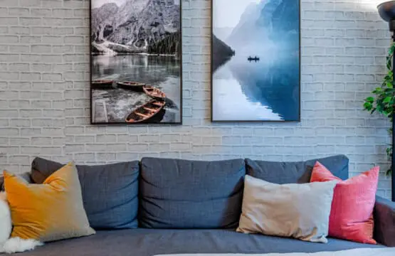 Gather in the spacious living room, where soft textures and mountain-inspired artwork create a calm, inviting setting. Perfect for relaxing with family or friends during your Vancouver stay.