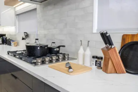 Enhance your stay in this luxury, fully stocked kitchen — perfect for creating delicious meals and memorable moments. Enjoy the art of cooking in a space designed for both style and function.