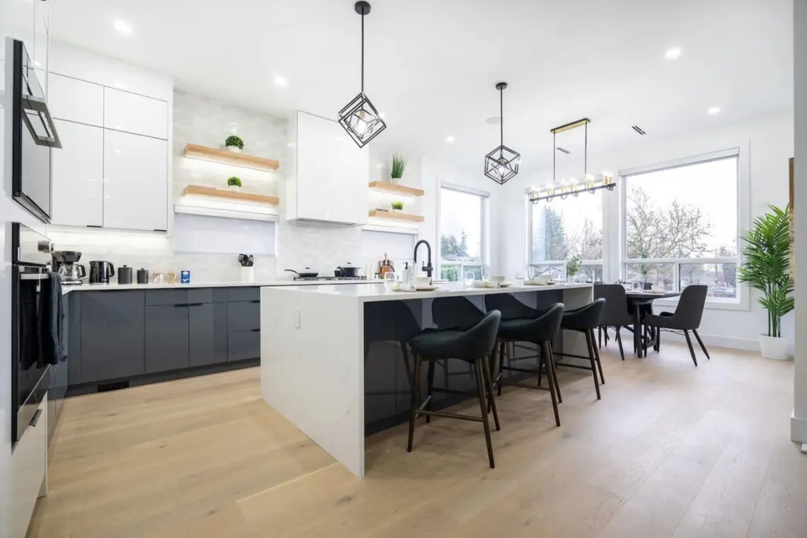 Enjoy culinary luxury in this modern designer kitchen featuring high-end appliances, a spacious island, and elegant finishes — the perfect blend of style and functionality for your stay.