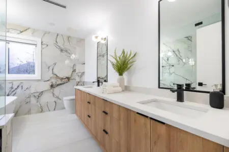 Ensuite Bathroom (Connected to Primary Bedroom 1): Experience tranquility in this spa-inspired ensuite featuring elegant finishes and a serene atmosphere — the perfect private retreat for unwinding in style.