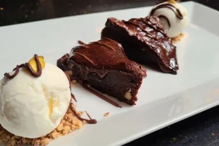 End your meal on a sweet note at Tasty’s Indian Bistro nearby — where indulgent desserts meet rich flavors in a beautifully modern setting.