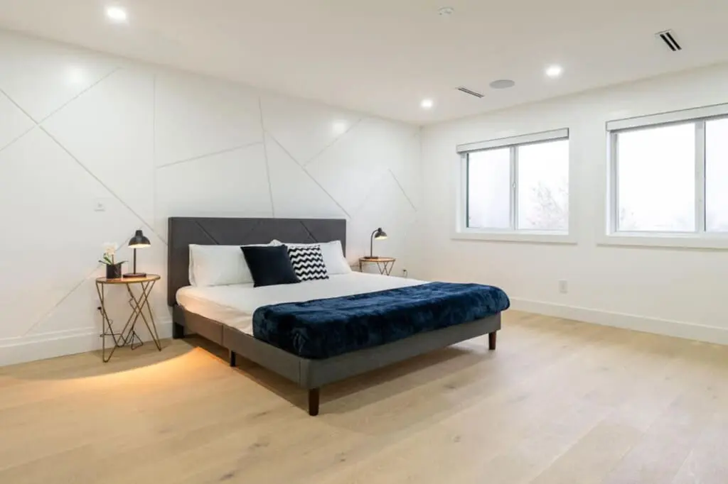 Primary Bedroom (Bedroom 1): Unwind in this spacious designer suite featuring a luxurious king bed and spa-inspired ensuite — the perfect blend of comfort and elegance.