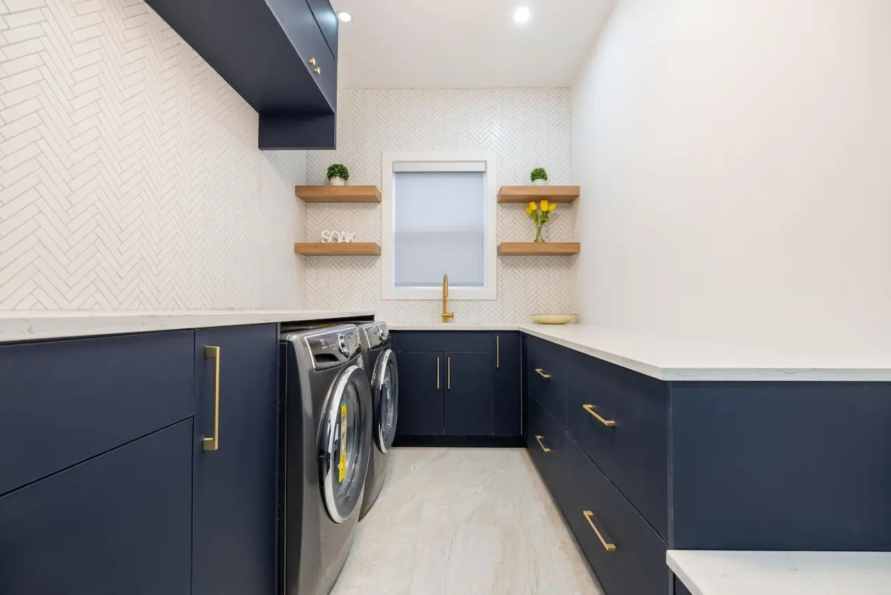 Keep your wardrobe fresh with ease in the spacious laundry room, featuring brand-new, high-end washer and dryer units. Modern design and thoughtful details make everyday convenience effortless.