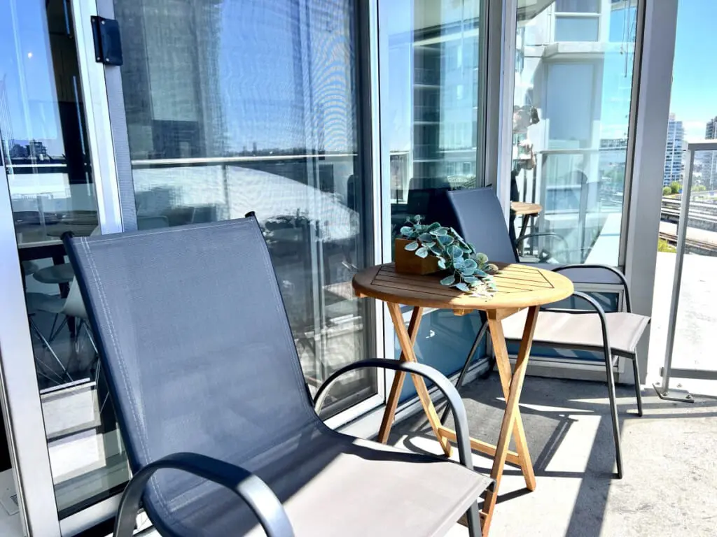Step onto the private balcony and soak in the sunshine, fresh air, and cityscape views — a peaceful spot to relax and enjoy your Vancouver escape.