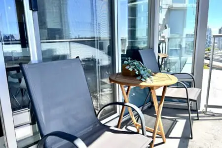 Step onto the private balcony and soak in the sunshine, fresh air, and cityscape views — a peaceful spot to relax and enjoy your Vancouver escape.