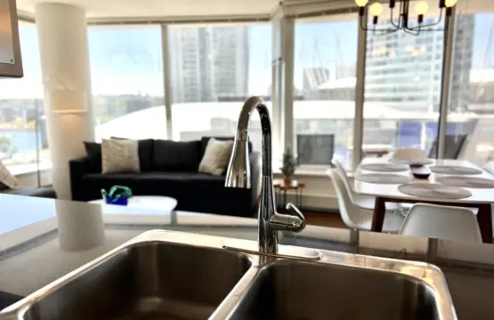 Enjoy modern simplicity in this thoughtfully designed kitchen space, where sleek finishes and open views create a perfect blend of style and function for your Vancouver stay.
