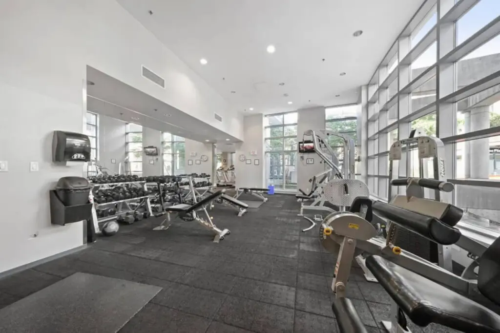 Maintain your fitness routine in the spacious, light-filled gym featuring free weights and strength-training equipment — designed for balance and wellness during your Vancouver stay.