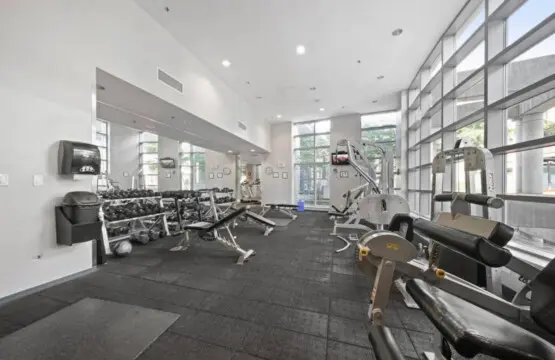 Maintain your fitness routine in the spacious, light-filled gym featuring free weights and strength-training equipment — designed for balance and wellness during your Vancouver stay.