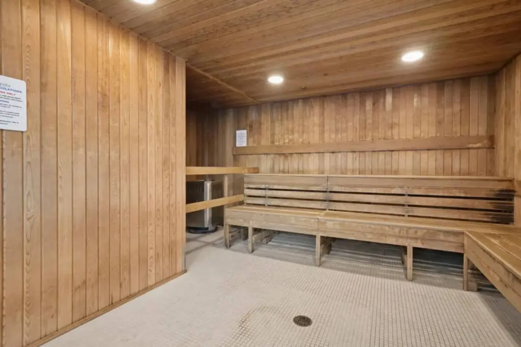 Soothe your senses in the inviting sauna, where warm cedar tones and gentle heat offer the perfect space to relax and recharge after a day in the city.