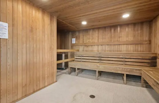 Soothe your senses in the inviting sauna, where warm cedar tones and gentle heat offer the perfect space to relax and recharge after a day in the city.
