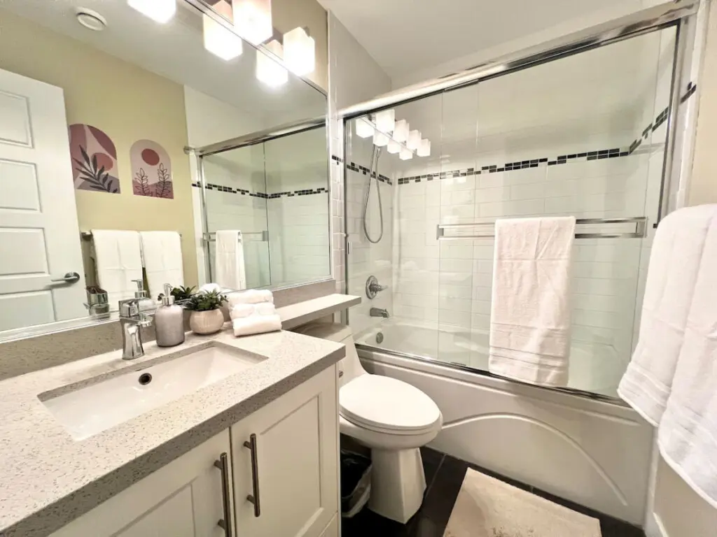 Luxurious and thoughtfully designed, this second-floor full bathroom is conveniently located near the primary bedroom and laundry area, offering comfort and modern elegance.