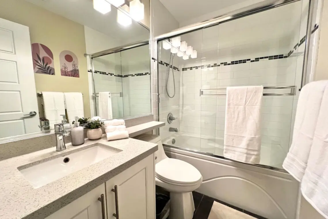 Luxurious and thoughtfully designed, this second-floor full bathroom is conveniently located near the primary bedroom and laundry area, offering comfort and modern elegance.
