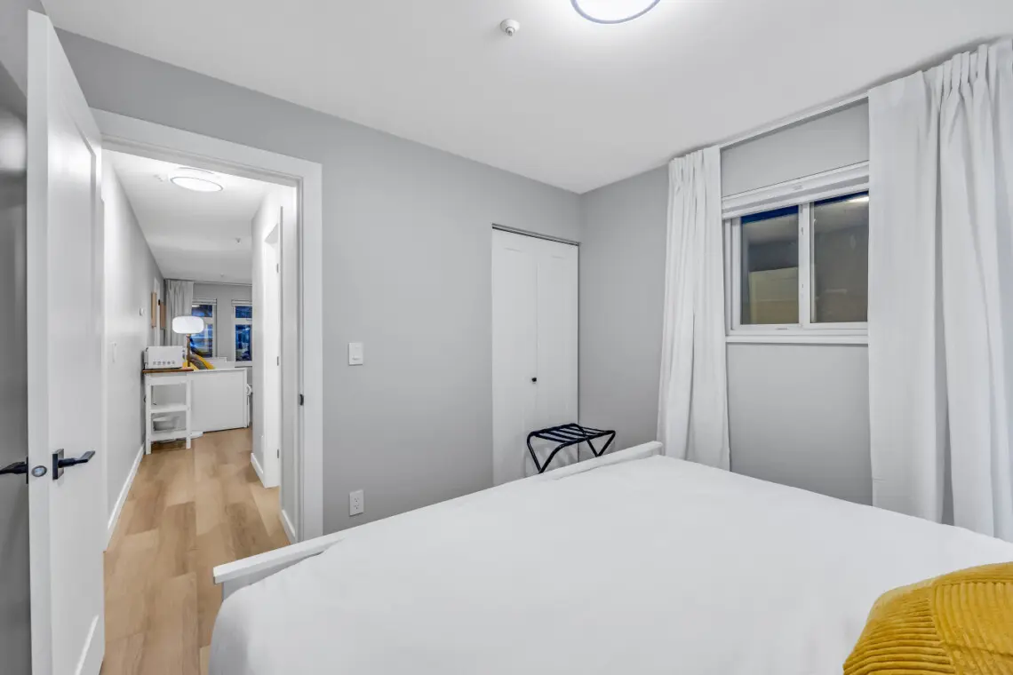 A calm and inviting bedroom designed for complete relaxation — a cozy retreat where comfort meets tranquility, offering the perfect place to unwind, recharge, and wake up refreshed for whatever the day brings.