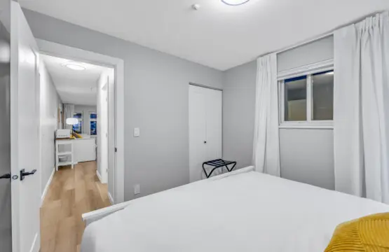 A calm and inviting bedroom designed for complete relaxation — a cozy retreat where comfort meets tranquility, offering the perfect place to unwind, recharge, and wake up refreshed for whatever the day brings.