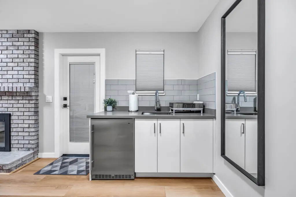 A bright and compact kitchen designed for convenience and comfort — perfect for preparing a quick breakfast, brewing your morning coffee, or sharing simple home-cooked meals during your stay.