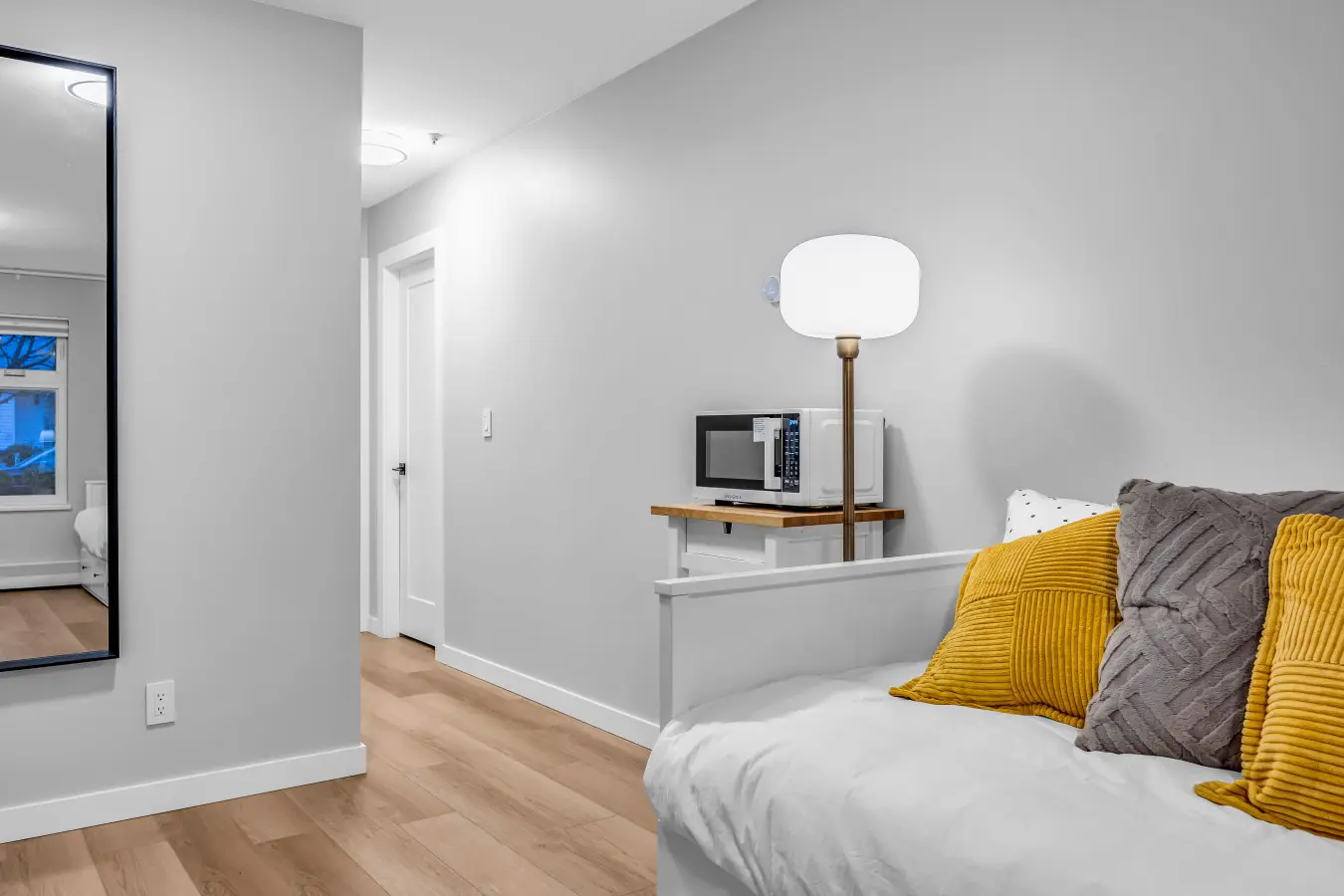 A bright and cozy corner designed for comfort and ease — featuring warm accents, soft textures, and thoughtful touches that make it an inviting space to relax or enjoy quiet moments at home.