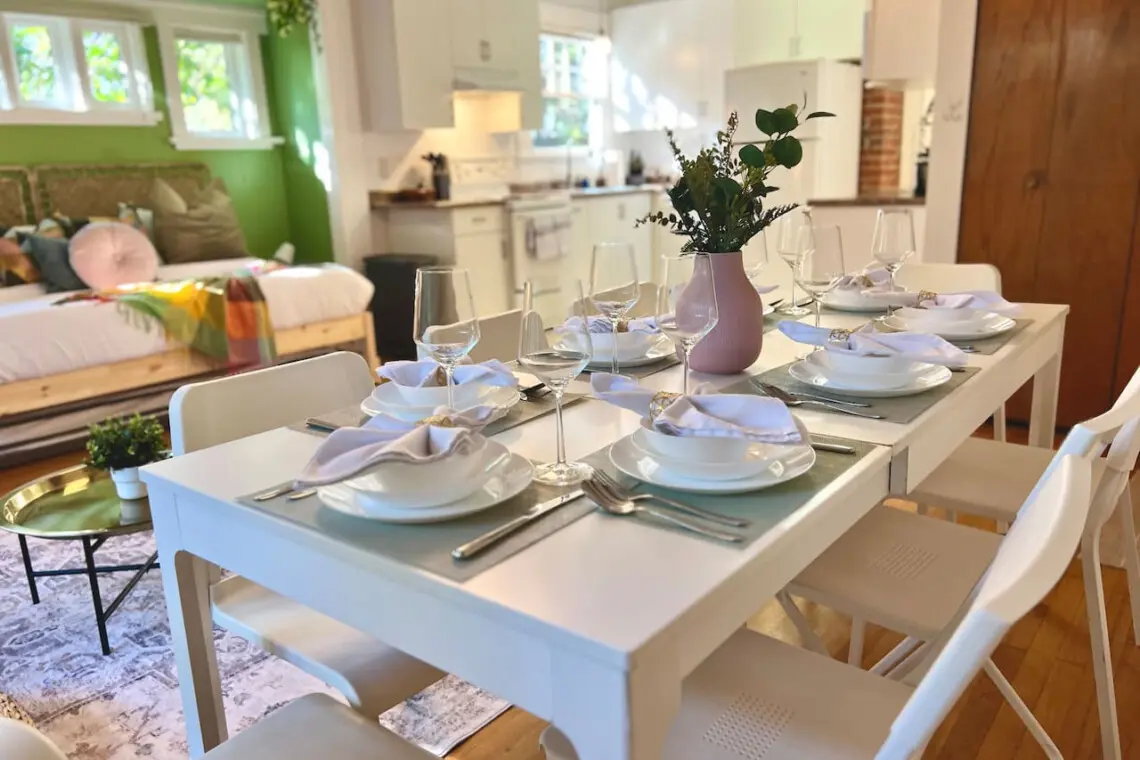 Bright and thoughtfully arranged, this open dining area invites guests to enjoy home-cooked meals and warm conversation in modern comfort. A welcoming touch to this stylish Vancouver stay.
