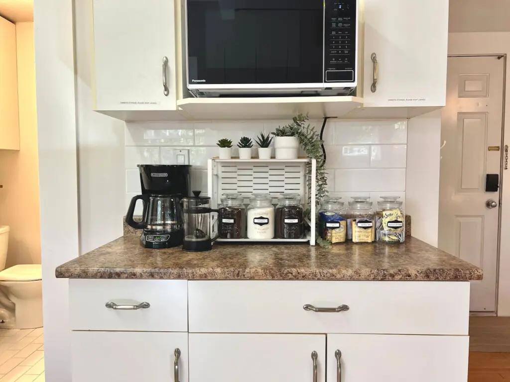 A convenient coffee and tea station offers everything guests need to start their day right. Thoughtful touches bring warmth and comfort to this modern Vancouver suite.