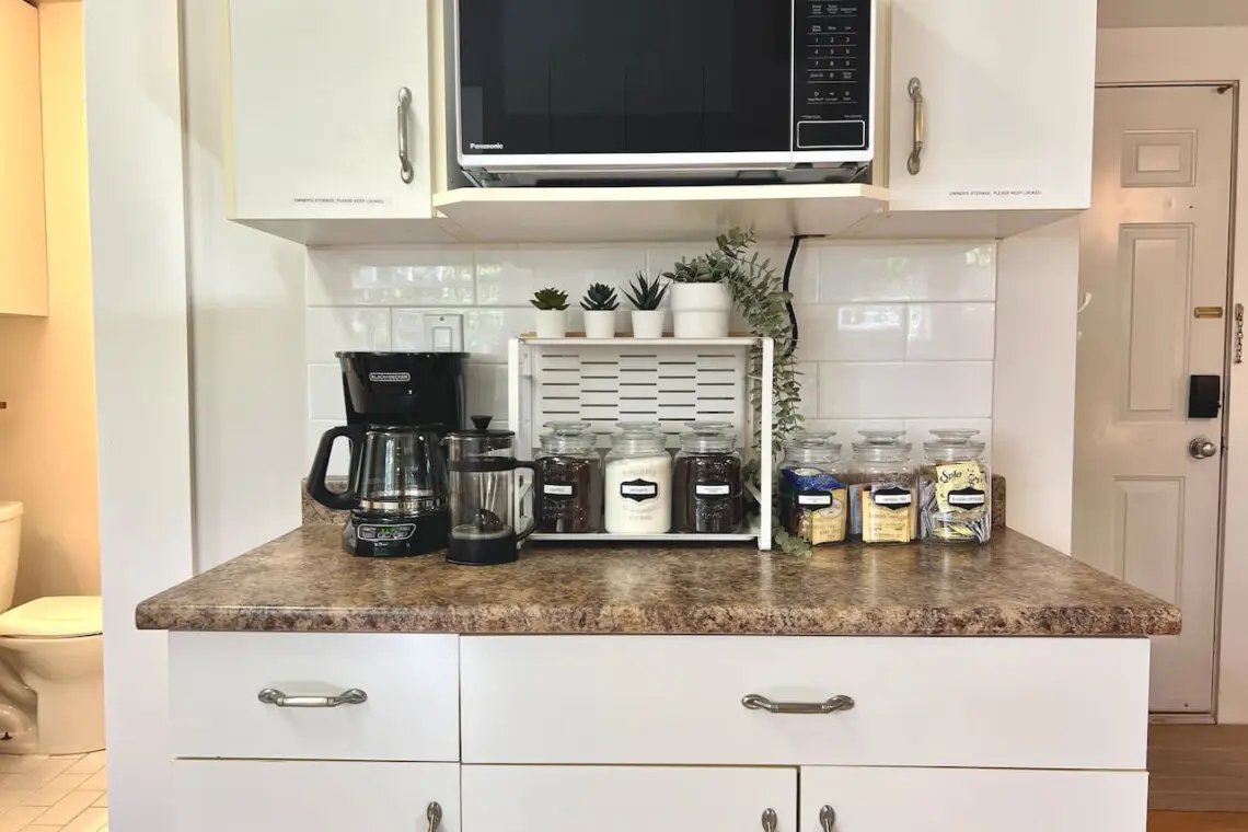 A convenient coffee and tea station offers everything guests need to start their day right. Thoughtful touches bring warmth and comfort to this modern Vancouver suite.