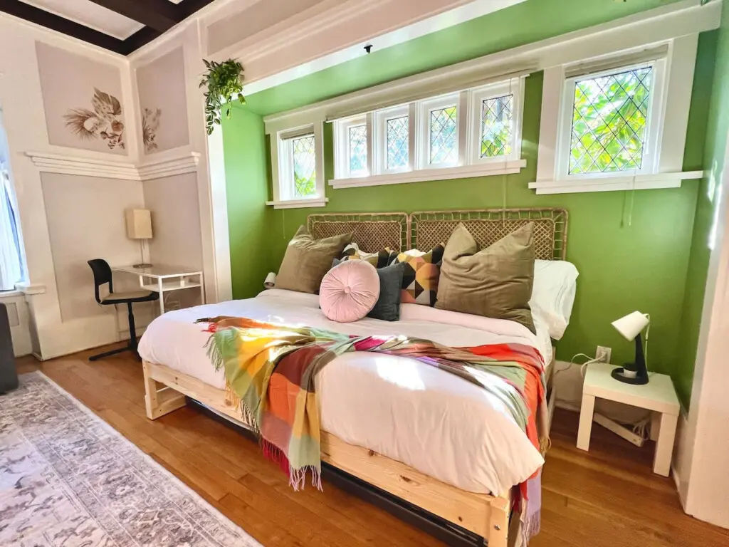 A bright and inviting bedroom where modern design meets cozy comfort. Guests can unwind in soft linens and natural light — the perfect retreat for a relaxing Vancouver stay.