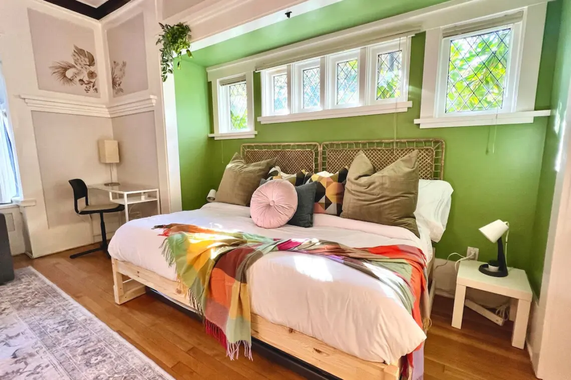 A bright and inviting bedroom where modern design meets cozy comfort. Guests can unwind in soft linens and natural light — the perfect retreat for a relaxing Vancouver stay.