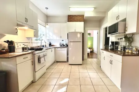 Spacious and well-equipped, this bright kitchen offers everything guests need to cook, dine, and feel at home. A perfect blend of modern convenience and cozy Vancouver charm.