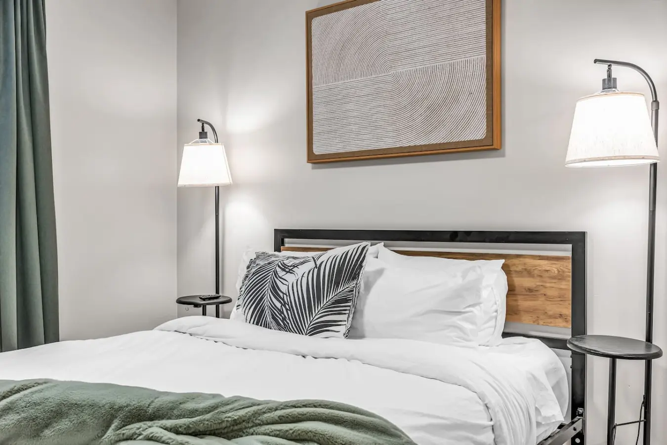 A cozy and modern bedroom featuring soft lighting and fresh linens — ideal for restful nights and peaceful mornings.