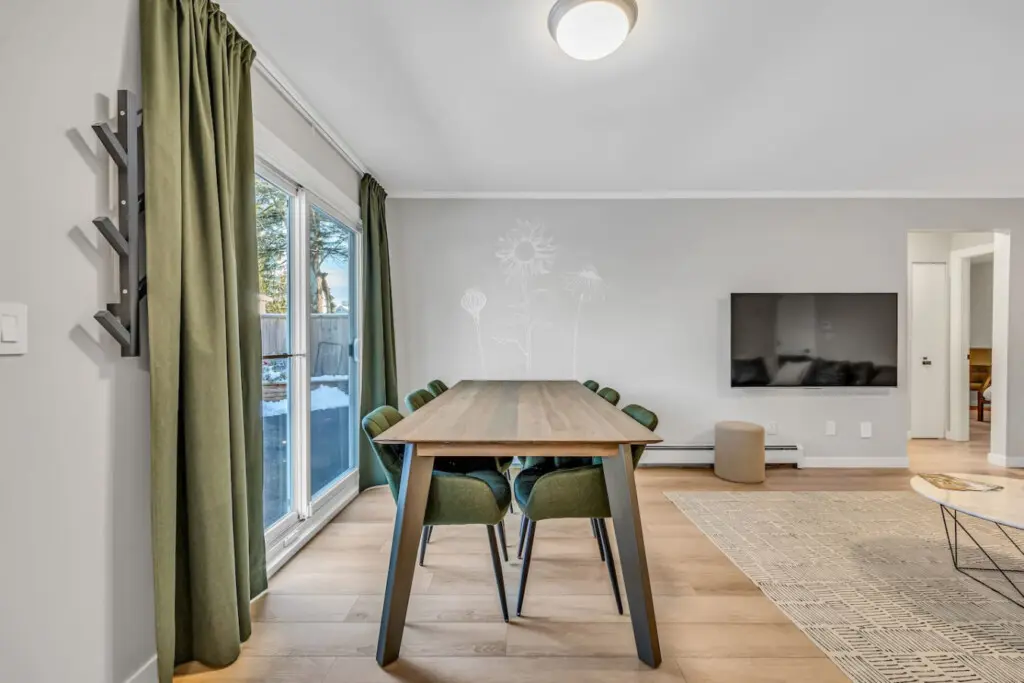 Share meals and meaningful moments around this sleek dining table for six. A bright, modern space perfect for family dinners or casual gatherings during your Vancouver stay.