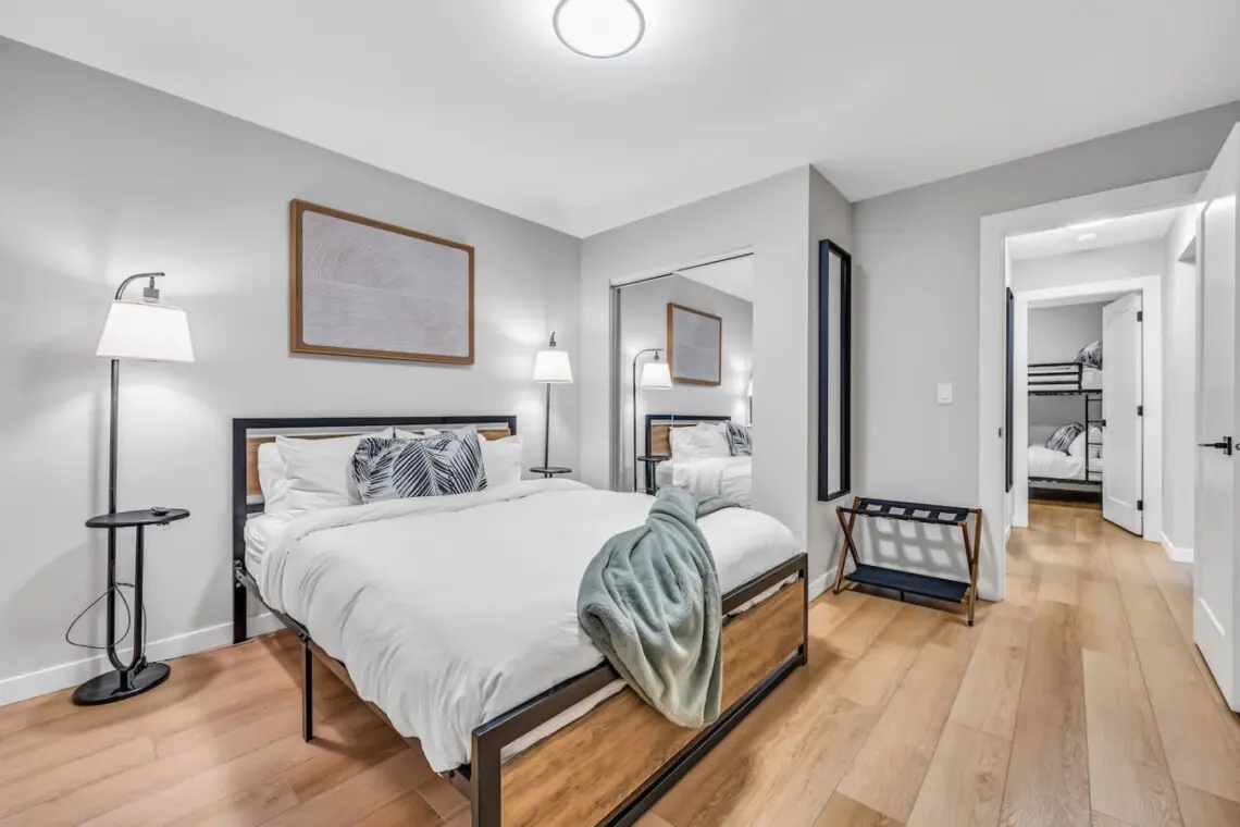 A bright and stylish bedroom offering modern comfort and cozy charm. Perfect for unwinding after a day of exploring Vancouver’s vibrant city life.