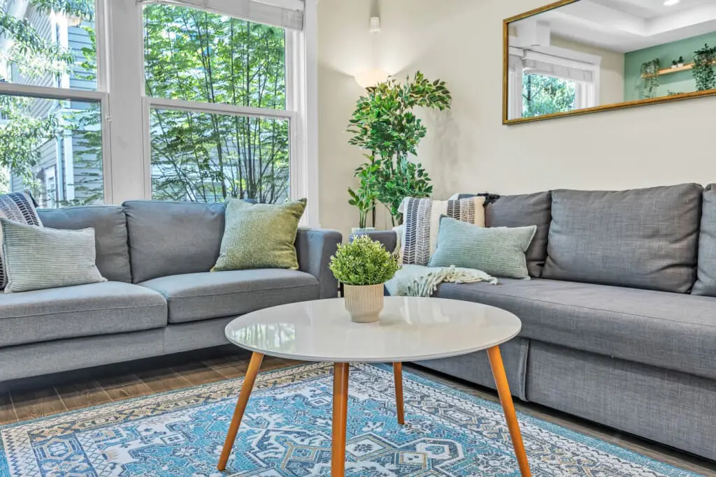 Spacious and inviting living area with comfortable seating — ideal for unwinding after a full day of exploring or enjoying cozy moments with family and friends.