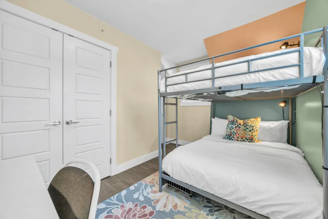 Cozy and functional double-sized bunk bed setup — perfect for families, kids, or extra guests looking for a comfortable night’s rest.