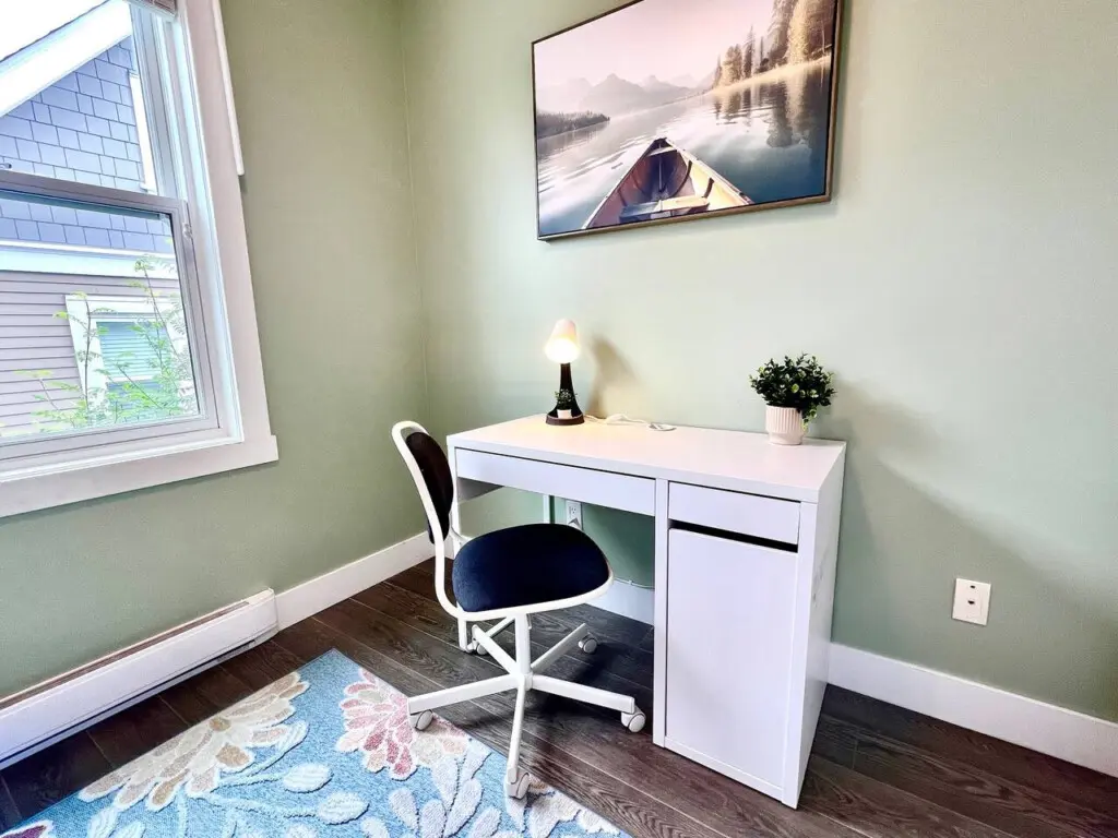 Dedicated workspace located in the 3rd bedroom with a comfortable chair and sturdy desk—ideal for remote work or planning your day.