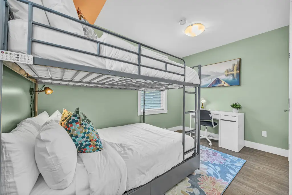 Fun and functional 3rd bedroom with Double sized bunk beds—perfect for kids or groups traveling together.