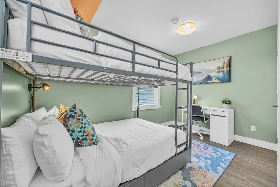Fun and functional 3rd bedroom with Double sized bunk beds—perfect for kids or groups traveling together.