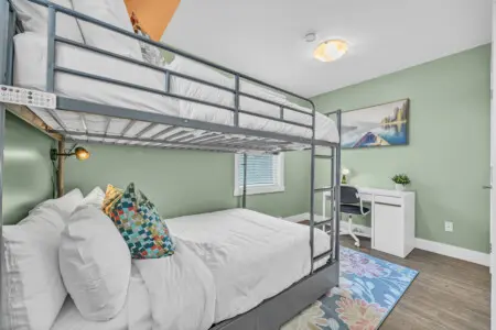 Fun and functional 3rd bedroom with Double sized bunk beds—perfect for kids or groups traveling together.