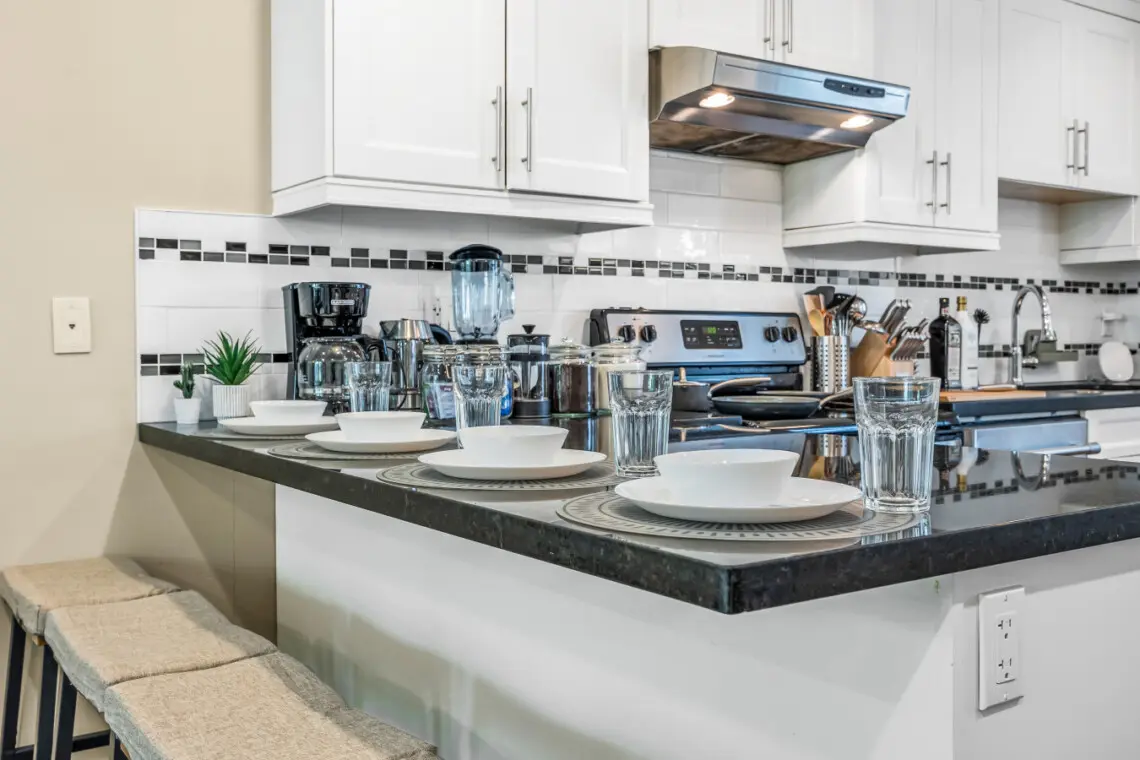 The generous countertop is perfect for prepping meals or enjoying a glass of wine while chatting with the chef.