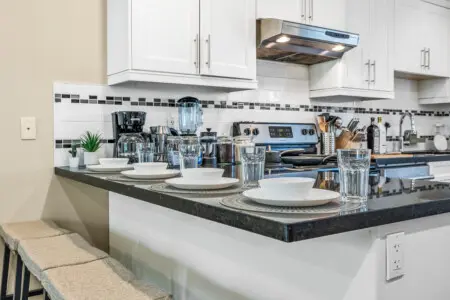 The generous countertop is perfect for prepping meals or enjoying a glass of wine while chatting with the chef.