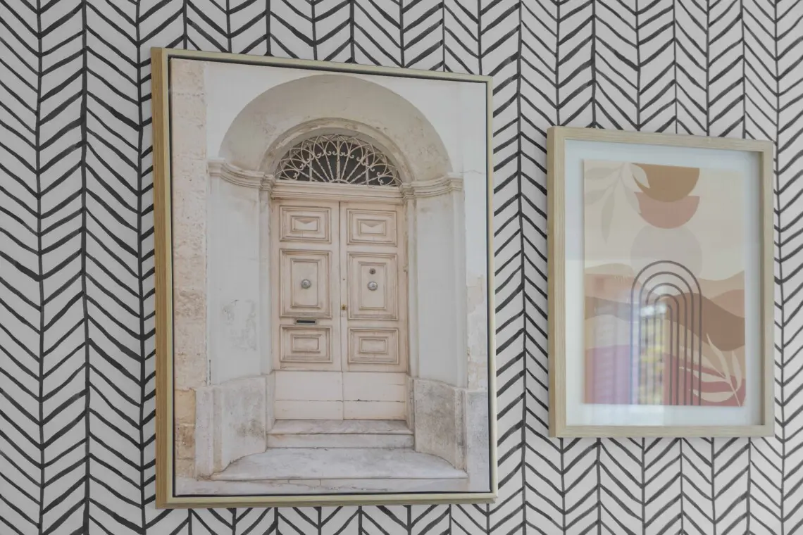 Thoughtfully chosen artwork adds warmth and personality to the second bedroom. The soft hues and clean lines complement the room’s modern aesthetic, creating a calm and stylish atmosphere that embodies contemporary comfort.