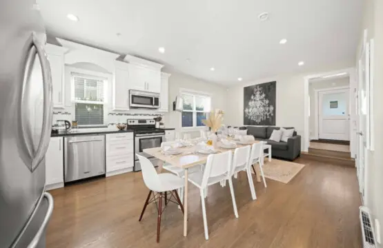 This bright open-concept space connects the kitchen, dining, and living areas seamlessly. Perfect for sharing meals, relaxing, and enjoying cozy evenings together.